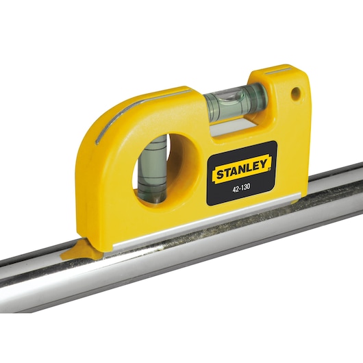 STANLEY 0-42-130 yellow magnetic spirit level photography, side angle on white background.