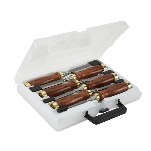 Set of four wood chisels with brown handles in a white plastic case with a black latch.