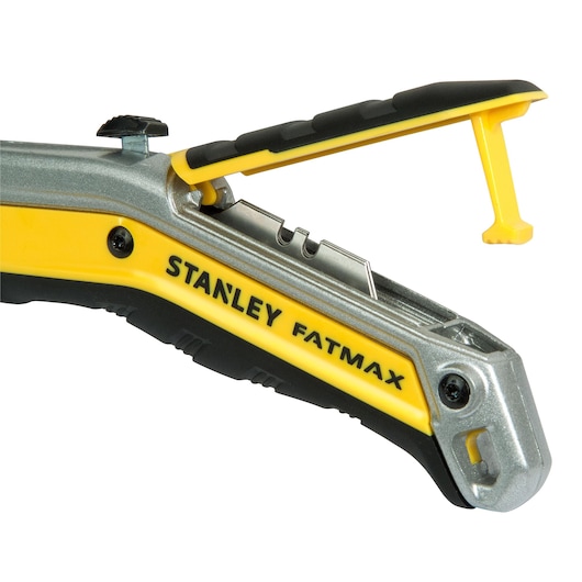 Photo of STANLEY FMHT0-10288 utility knife, yellow and black, side view with open blade storage compartment.