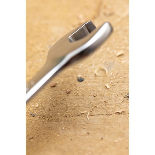 Photo of STANLEY FMMT13031-0 wrench head, metal finish, on a wooden surface, close-up angle.