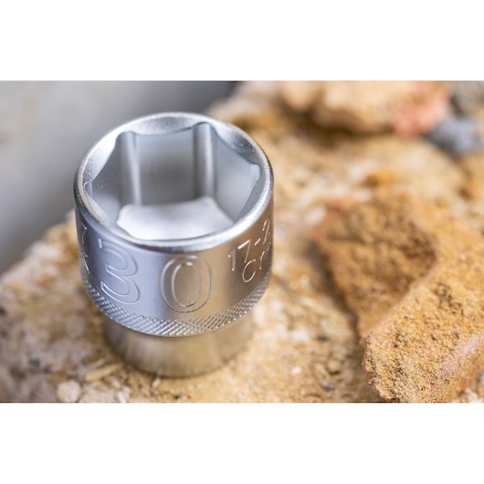 STANLEY FMMT17242-0 socket close-up on a rough stone surface, metallic finish and engraved size visible.