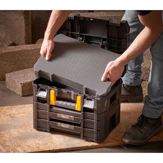 STANLEY FMST1-72365 foam insert for stackable tool storage box in use, front angle.