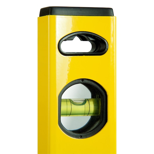Photo of STANLEY STHT1-43103 yellow spirit level close-up, showing horizontal vial and hand grip, front angle.