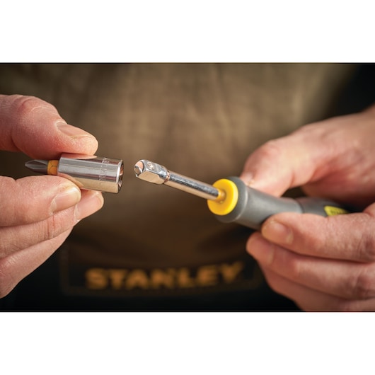 STANLEY STMT86124-0 bit holder with socket and screwdriver handle close-up photography.