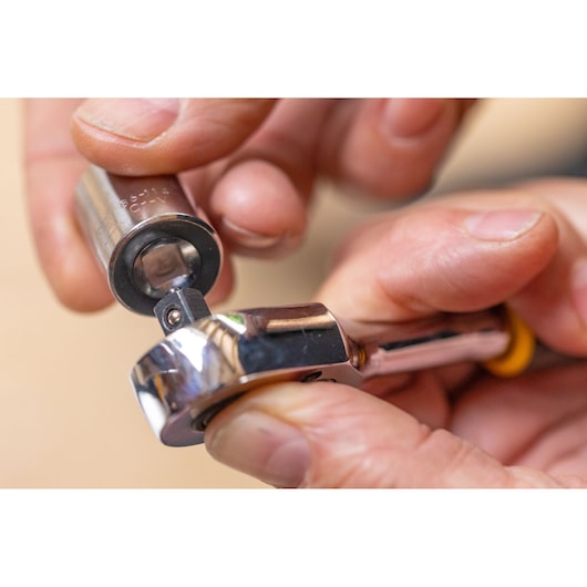 STANLEY STMT86315-0 ratchet handle and socket in close-up photography, chrome finish, tool category.